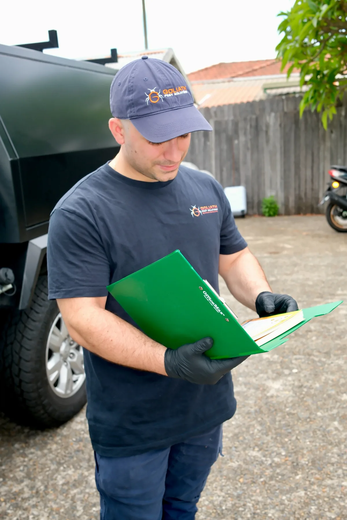 Goliath Pest Solutions operator reviewing job details